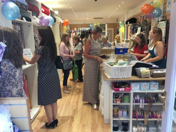 Customers attend sewing shop's first birthday