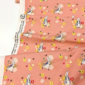 Salmon pink Peter Rabbit cotton fabric