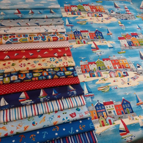 Beach holiday themed cotton fabric collection from Makower UK